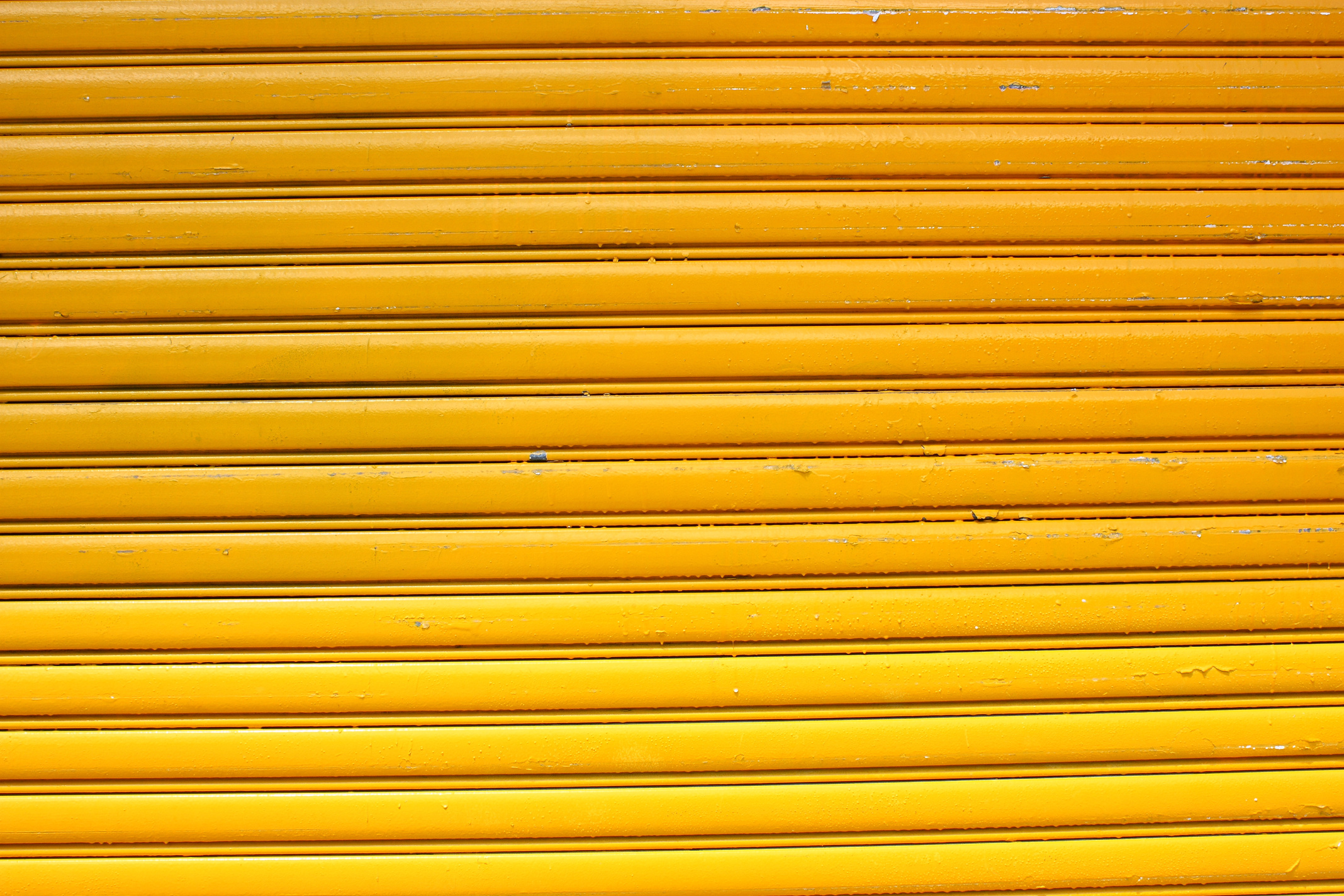 Yellow rolling garage door